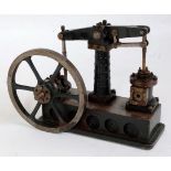 A well engineered part complete stationary beam engine comprising of single vertical cylinder,