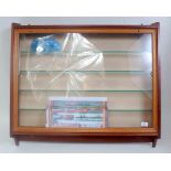 A small display cabinet suitable for 00 gauge items (G) and a small display cabinet suitable for a