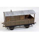 Carette for Bassett-Lowke goods brake van, Gauge 1, tinplate GW on wooden base (a/f)