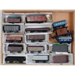 Large tray containing kit built wagons, 12 open with two loco sand and one goods brake,