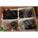 Small tray of spare parts as removed from a modeller’s workshop including wheels, wagon wheel