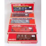 Five Lionel goods wagons: N AND W hopper 9111; Morton Salt 9114; CP bunk car 6-5728; IC covered