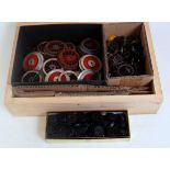 A small wooden box of assorted wheels of various gauges including Lionel and Hornby as removed