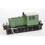 Atlas 0-6-0 diesel shunter light green on black base with white cab roof, buffer beams repainted (