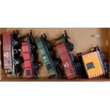 A large tray containing G scale 4x mixed type open wagons - 2x DR brown, DR green, 94705 red and a