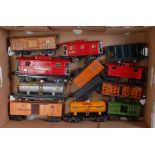 Twelve assorted Lionel goods wagons, mix of bogie and 4-wheel, noticeable marks (F)