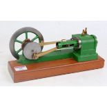 A Clarkson live steam horizontal mill engine, hand painted in green, comprising of a sealed single