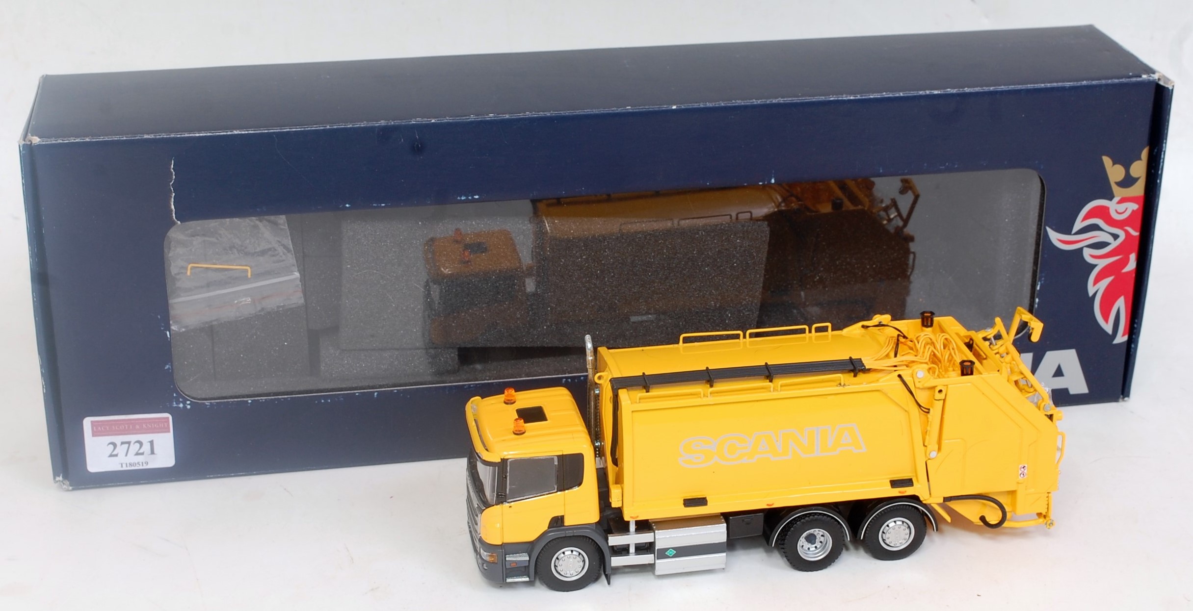 A Tekno 1:50 scale model of a Scania P340 6x2 refuse collector comprising yellow body with silver