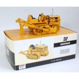 A Speccast 1:16 scale diecast model of a Caterpillar D2 track type tractor with tool bar ripper,