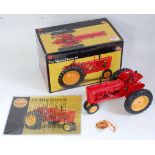 An Ertl Precision Series 1:16 scale model of a Massey Harris 44 tractor, model No. 13082, appears as