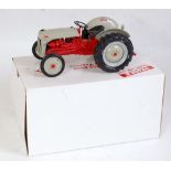 A Danbury Mint 1:16 scale model of a 1952 Ford 8M tractor, comprising grey and red body with grey