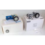 A Universal Hobbies and Danbury Mint 1:16 scale boxed diecast tractor group to include a 1962 Ford