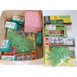 A collection of boxed and bubble packed Britains farm and garden accessories to include No. 1822 oak