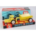 A Britains No. 9630 Fordson tractor and rear dump, rare yellow version with grey hubs, sold in the