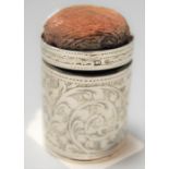 An Edwardian silver needlecase/pin cushion of cylindrical form with engraved decoration