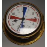 A Sestrel lacquered brass cased ships masthead clock with red, white and blue dial, dia. 18cm