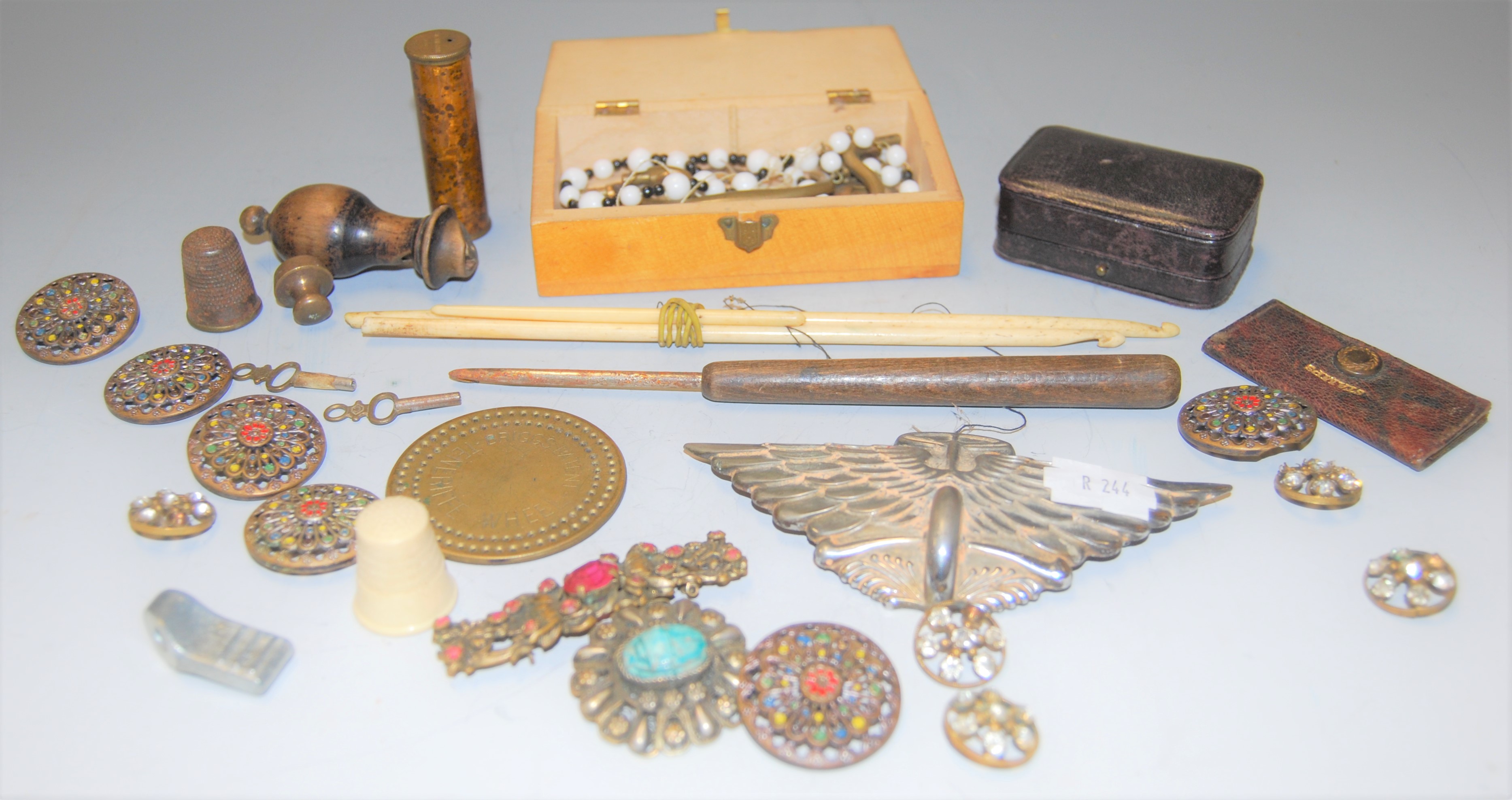 A small collection of miscellaneous items to include Mauchlin ware box, button hook, leather stamp