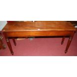 A Victorian mahogany round cornered window seat, raised on turned supports, w.122cm