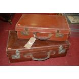 Two leather suitcases