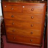 A Victorian mahogany chest of two short over four long drawers, having turned knob handles within