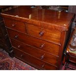 A mid-Victorian mahogany round cornered chest of two short over three long drawers, with turned knob