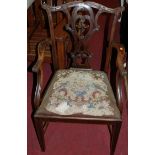 A set of five Chippendale style relief floral carved mahogany splatback dining chairs, each having
