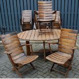 A contemporary stained and slatted teak garden suite comprising; oval table and six folding
