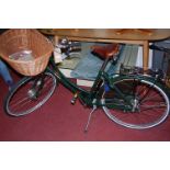 A Pashley Princess Classic ladies bicycle, having woven wicker front basket, Brooks tan studded