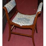 An Edwardian mahogany and satinwood strung music seat, of urn form with later floral padded seat,