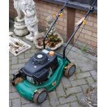 A petrol driven lawnmower