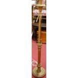 A gilt wood spiral and plain fluted standard lamp, raised on circular stepped base, height (