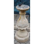 A reconstituted stone pedestal sundial having engraved metal top, height 100.5cm