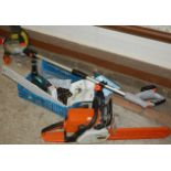 R412 - A Stihl petrol driven chain saw, together with an electric strimmer (2)
