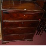 A 19th century Continental mahogany square front chest of four long drawers, having upper brushing