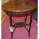 An Edwardian mahogany and satinwood strung oval two-tier occasional table, w.60cm
