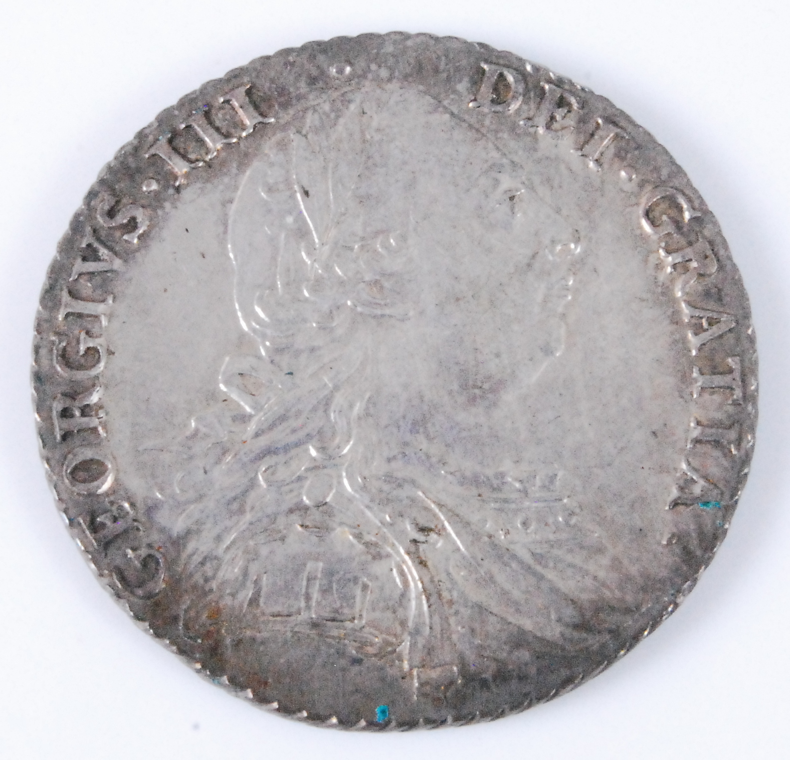 Great Britain, 1787 shilling, George III laureate and draped bust, rev; crucifrom shields around