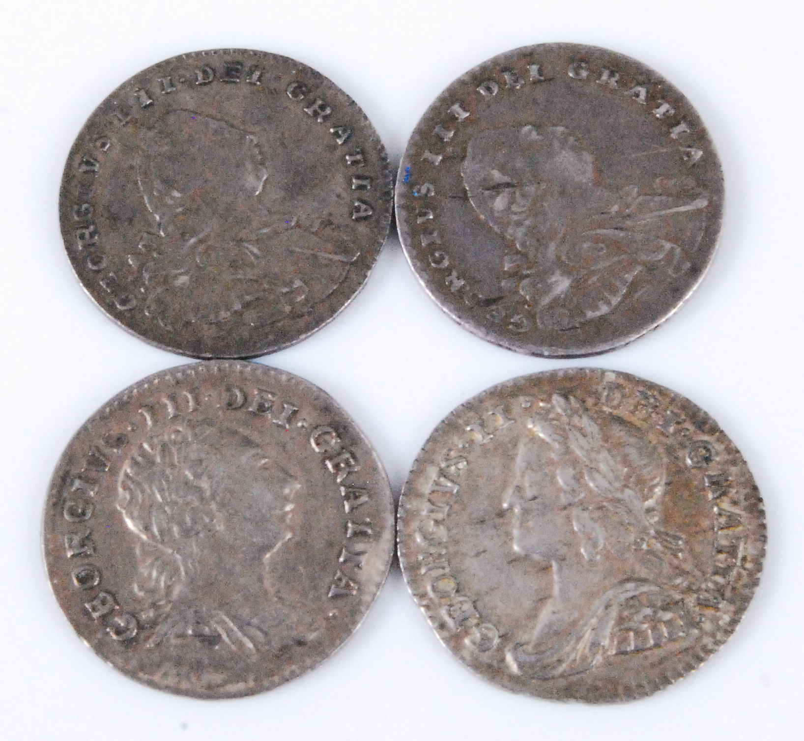 Great Britain, Four Maundy Money 1d coins to include George III 1743, 1786, 1795 and 1800. (4)