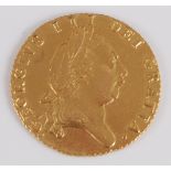 Great Britain, 1787 gold spade guinea, George III laureate bust, rev: crowned shield above date. (