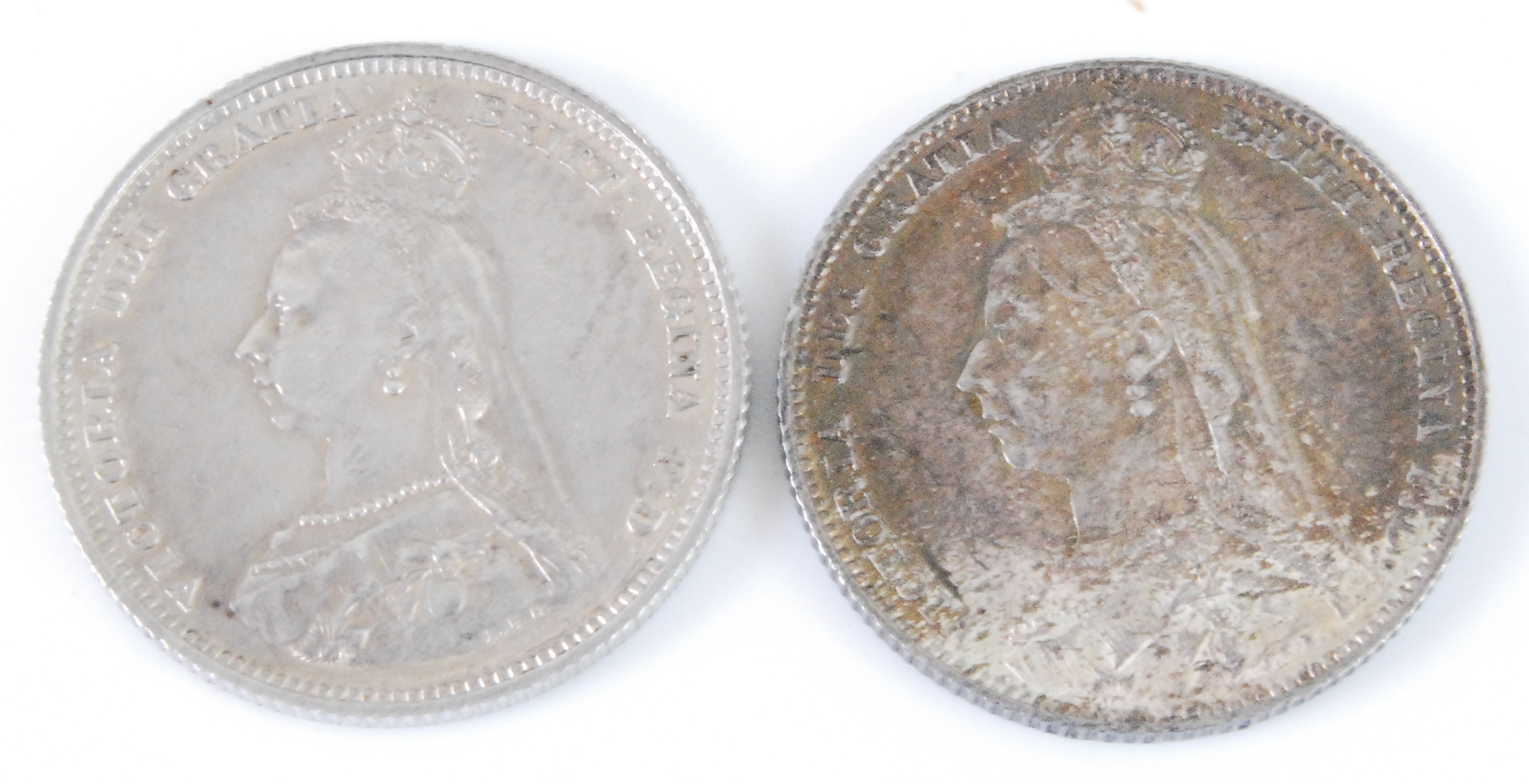 Great Britain, 1887 shilling, Victoria "jubilee" head, rev; crown above Royal quadrants within