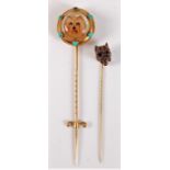 Two stick dog stick pins: a reverse painted intaglio stick pin of a Yorkshire terrier, collet