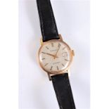 A lady's 9ct Longines Automatic wristwatch, the signed round cream dial with baton numerals,