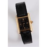 A lady's Must de Cartier quartz wristwatch, the signed black rectangular dial with Roman quarter