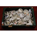 A box of assorted Victorian and later childs feeding cups and gravy boats etc