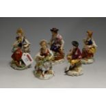 A pair of early 20th century Sitzendorf porcelain figures, in the form of a courting couple, each in