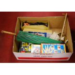 A box of miscellaneous items to include a Pelham skeleton puppet, boxed wooden finger puppets, boxed