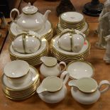 A Royal Doulton six place setting tea and dinner service, in the Clarendon pattern