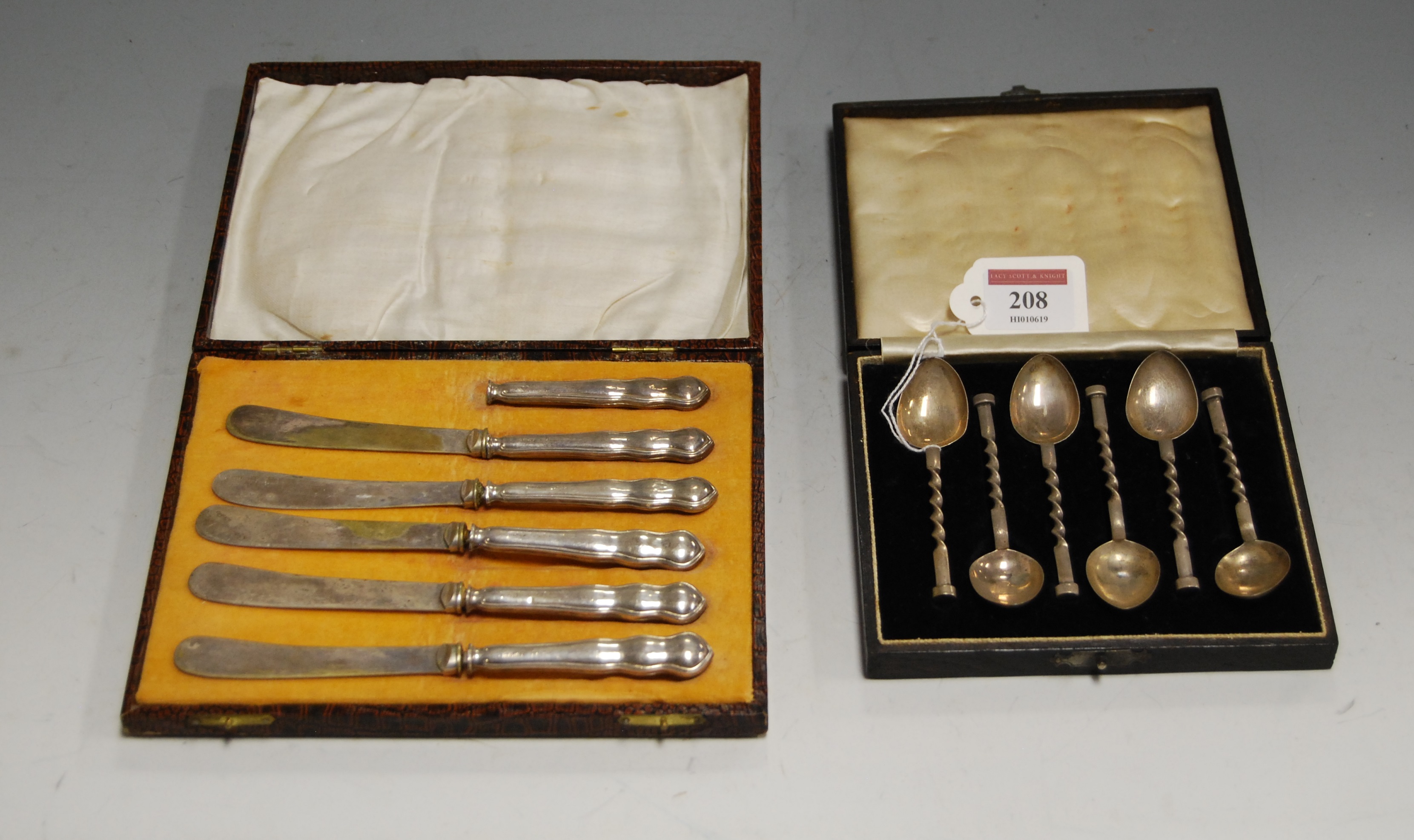 A set of six George V silver coffee spoons each having a plain bowl with spirally turned handle in