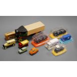 A small collection of modern issue diecast toy vehicles to include Ghibli Maserati, Porsche Carerra,