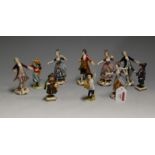 A set of six late 19th century continental porcelain figures of dancing couples, each in standing