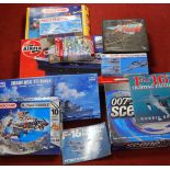 A collection of boxed children's toys and games to include Meccano hobby kits, aircraft weapons,